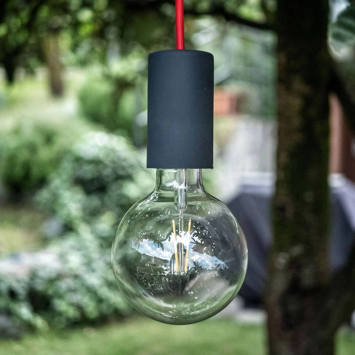 Lámpara de exterior en silicona resistente al agua.
