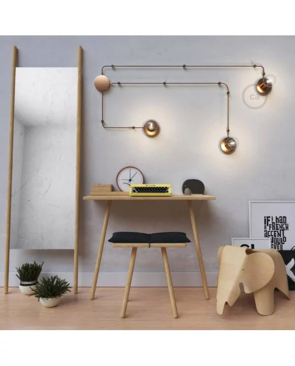 Spostaluce, el punto de luz en metal con cable textil
