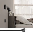 Lámpara Spostaluce con articulación metálica orientable