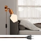 Lámpara Spostaluce con articulación metálica orientable