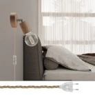 Lámpara Spostaluce con articulación de madera orientable