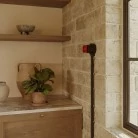 Interruptor de porcelana con base para pasacables