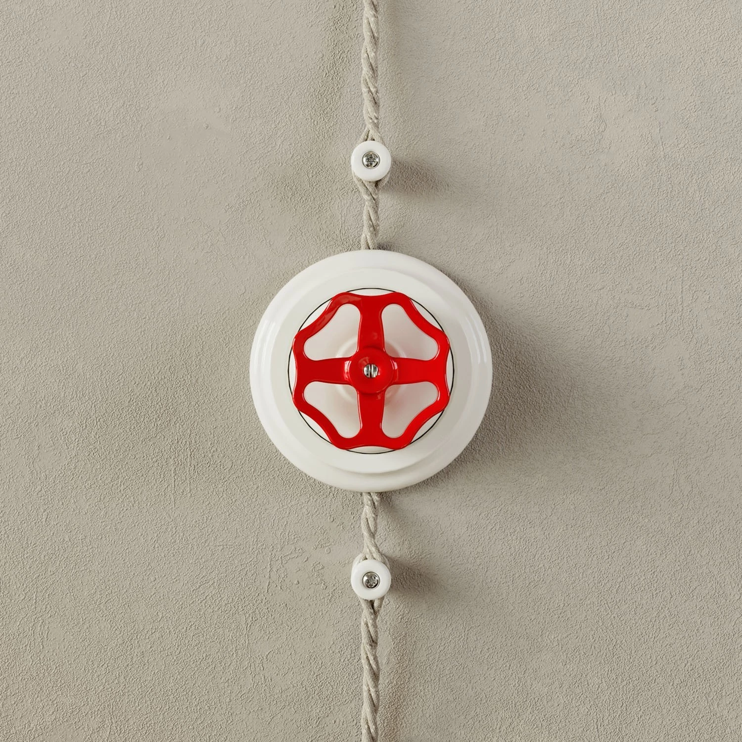 Interruptor de porcelana blanca con pomo y base.