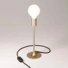 Lámpara de mesa de metal con bombilla vista