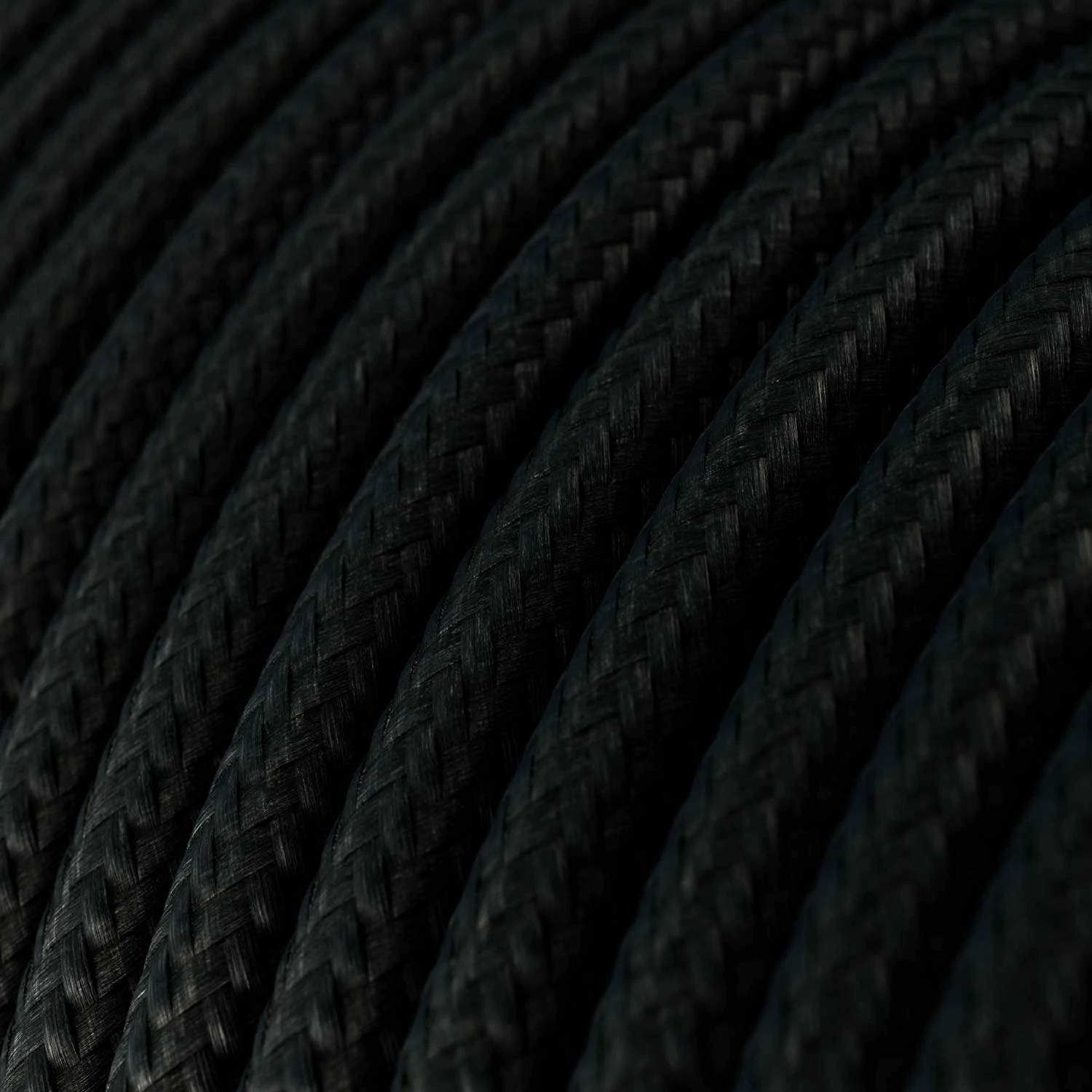 Alargador eléctrico con cable textil negro brillante 2P 10A