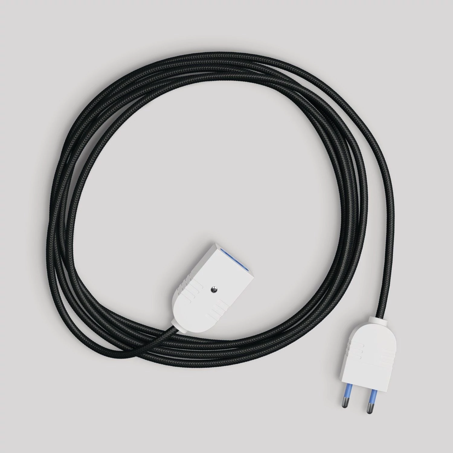 Alargador eléctrico con cable textil negro brillante 2P 10A