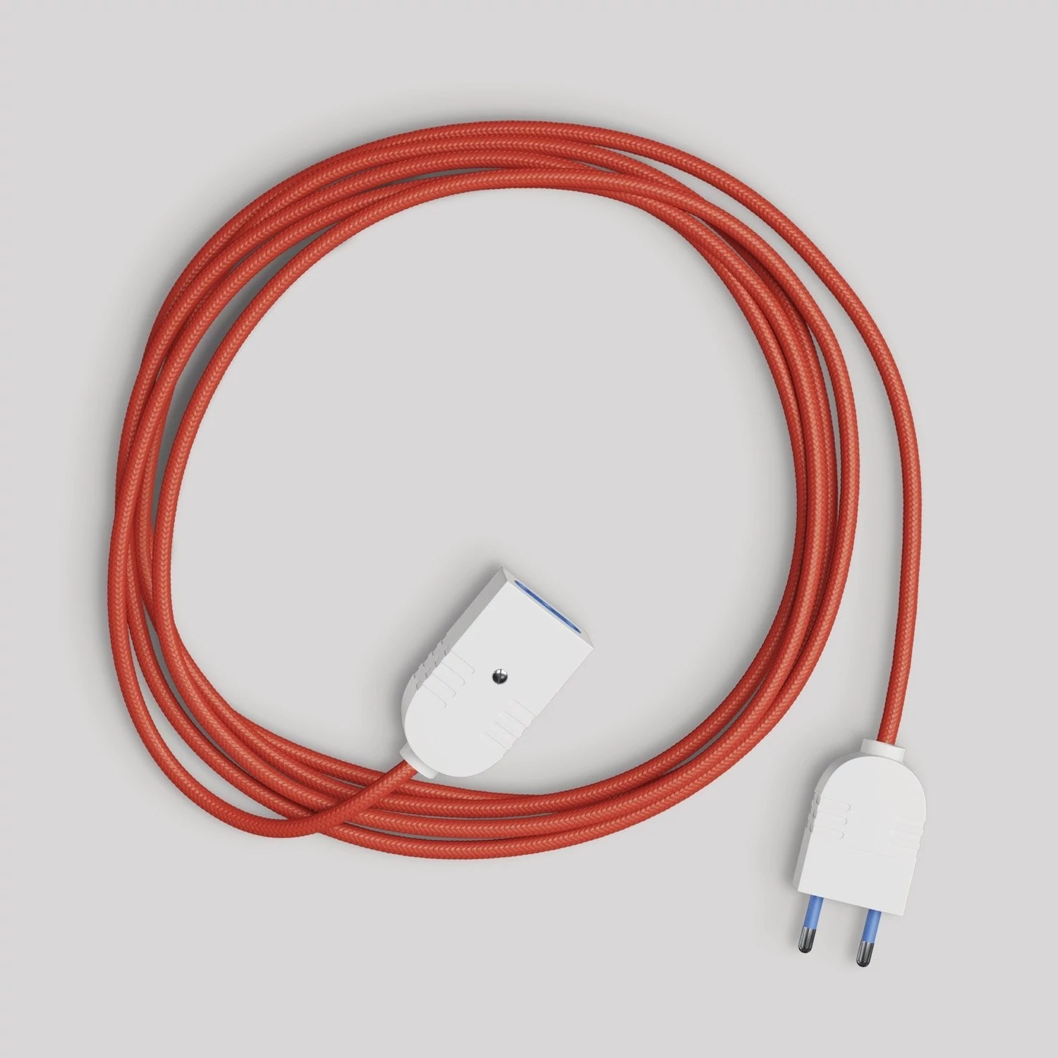 Alargador eléctrico con cable textil rojo brillante 2P 10A