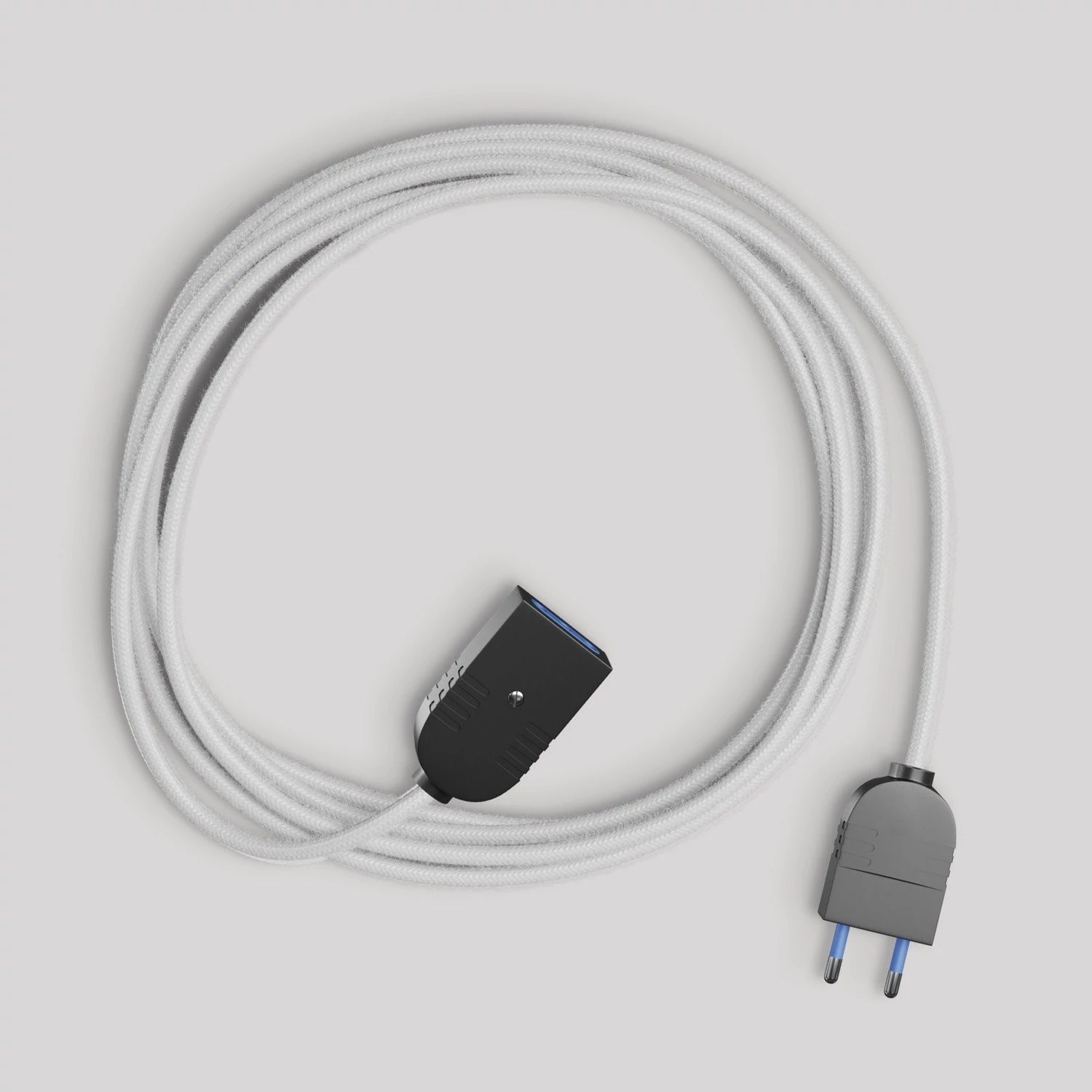 Alargador eléctrico con cable textil blanco brillante 2P 10A