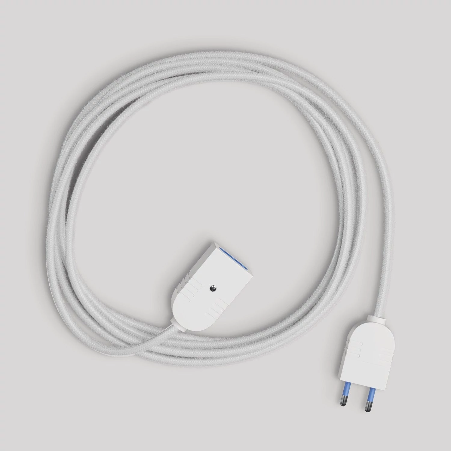 Alargador eléctrico con cable textil blanco brillante 2P 10A