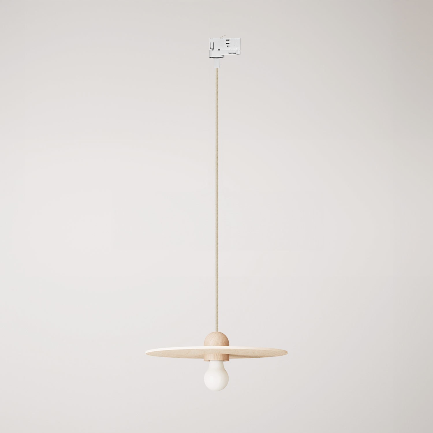Lámpara sobre carril de madera con cable textil y pantalla