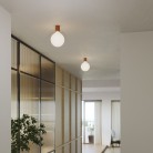 Aplique de metal con bombilla globo efecto porcelana